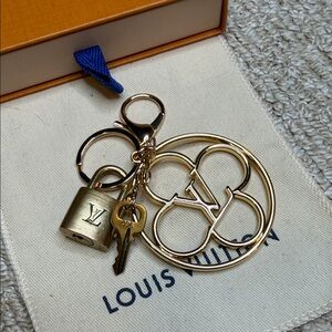 Louis Vuitton Gold Lock and Key #306 with keychain